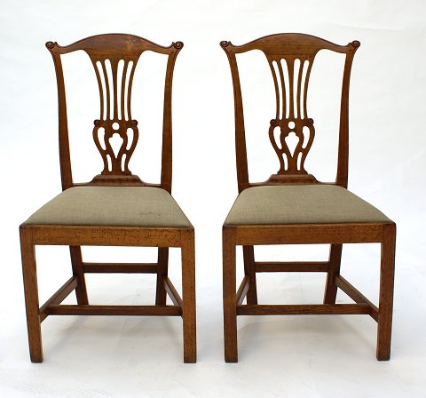 A pair of saloon chairs
