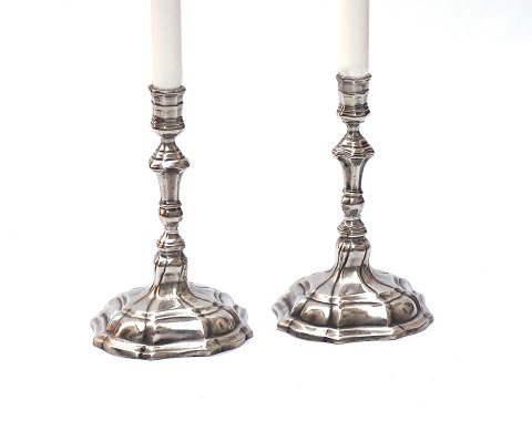 A pair of baroque tin candle holders, around 1750
