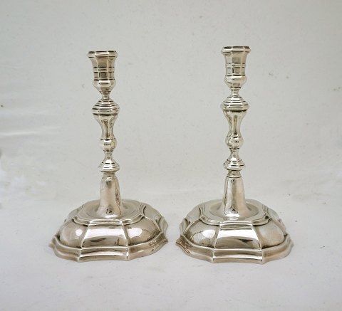 A pair of baroque sterling candle holders