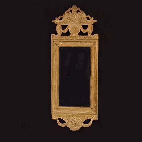 A gilt Gustavian mirror. Sweden circa 1780. 
81x30cm