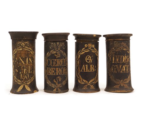 Four wood cut drugstore jars. Circa 1780. H: ca. 
21cm