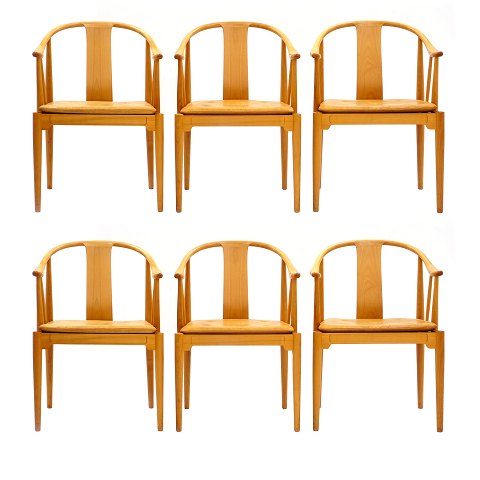Set of 6 China Chairs by Hans J. Wegner. Light 
cherry wood with leather seat