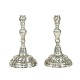 A pair of rokoko candle holders, tin