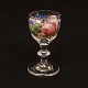 An enamel decorated glass. Made circa 1860. H: 8,8cm