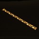 An Art Noveau Georg Jensen bracelet. 18ct gold. Period 1933-44. L: 20cm. W: 28gr