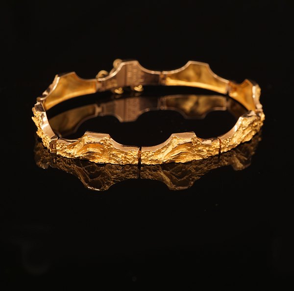 A 14kt gold Lapponia bracelet from 1976. L: 19cm. W: 16,6gr