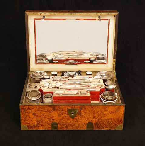 An almost complete  Toilet-Box with circa 50 pieces. France circa 1880. H: 16cm. W: 38cm. D: 26cm