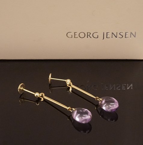 Georg Jensen: Et par ørestikker i 18kt guld. Leveres i original æske. L: 4,2cm + lås