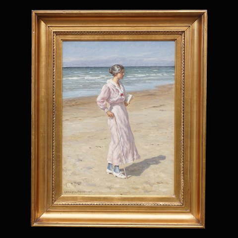 N. F. Schiøttz-Jensen, 1855-1941: Kvinde på Lønstrup strand. Olie på lærred. Signeret og dateret 1916. Lysmål: 48x34cm. Med ramme: 66x80cm
