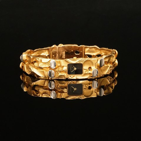 A 14kt gold Lapponia, Finland, quartz watch. Bracelet inside: Ca. 5x5,8cm