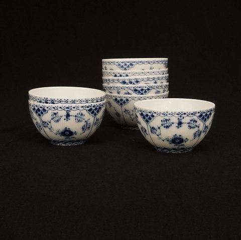 A set of nine Royal Copenhagen blue fluted full lace small bowls. #1142-4. H: 6,3cm
