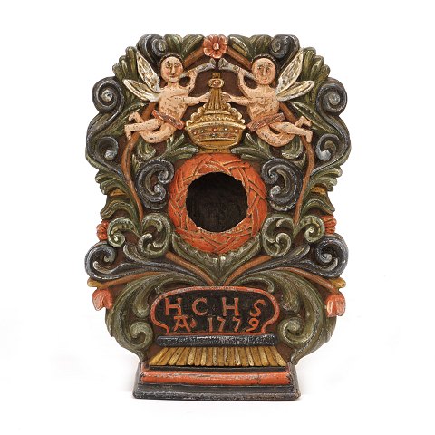 Wood cut pocket watch stand. Dated 1779. H: 25,5cm