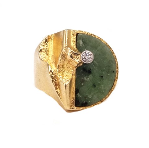 18kt gold Lapponia ring by Björn Weckström with a zoisit and diamond of circa 0,5ct. Ringsize 55