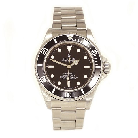 Rolex Submariner ref. 14060M. Solgt første gang 
20.08.2010 af Wempe Hamborg. Serviceret af 
Bucherer februar 2022. Leveres med boks, 
certifikat og øvrigt tilbehør. D: 40mm