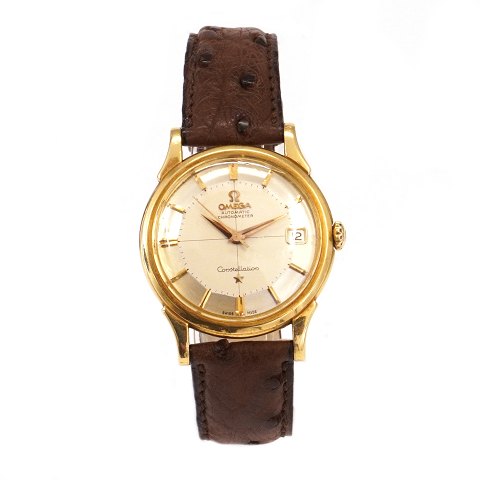 Omega Constellation Pie Pan aus 18kt Gold mit Box 
und Zertifikat Ref. 14382 82SC verkauft am 01.06 
1961. Kaliber 561. D: 34mm