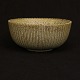 A large stoneware bowl by Arne Bang. Signed. H: 10,3cm. D: 22,2cm