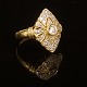 Art deco ring i 18kt guld prydet med diamanter. Centerdiamant ca. 0,25ct. Ringstr. 58