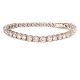 Tennisarmbånd i 18kt hvidguld prydet med 38 brillantslebne diamanter på hver ca. 
0,25ct i alt ca. 9,5ct. L: 18,5cm