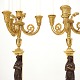 Et par lueforgyldte kandelabre hver til fire lys. Frankrig ca. år 1820. Empire. H: 57cm